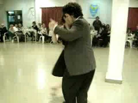  Federico Naveira  and  Inés Muzzopappa  are  dancing  to  the  tango  "  El Flete  "