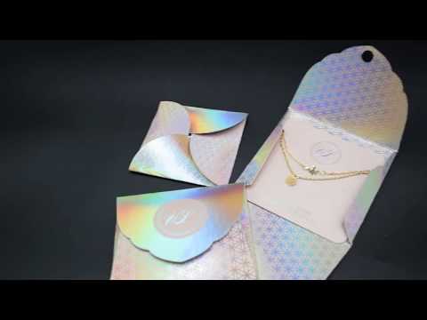 Print effect with Aqua Aura foiling and spot-uv