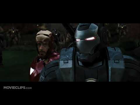 Trailer collage: Stark Expo main stage, Monaco racetrack, and hangar showdown—mapped to AC/DC, orchestral hybrid, and DJ-mixed party cuts