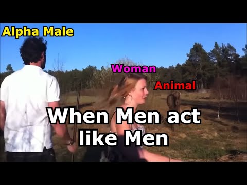 Man protects his woman from wild animal