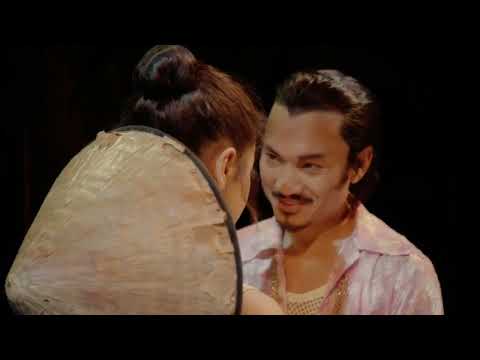 Miss Saigon trailer end card with logo and rotor light wash