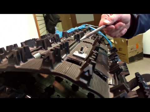 Studded Snowmobile Tracks - Traditional Studding vs. Pre-Studded