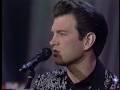 Chris Isaak sings "Solitary Man" 