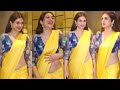 Shraddha Das Flaunts Her Exy FIgure In Yellow Saree Rised The Tempreture At Airport