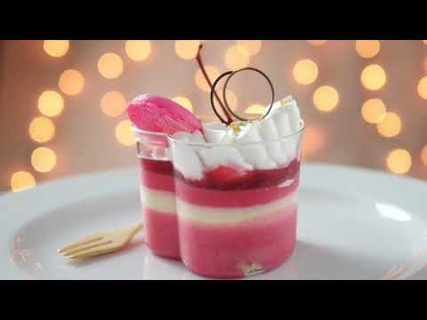Colorful strawberry cake and macaron in white