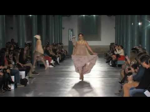 Model Carla Matadinho trips during Carlos Gil Spring/Summer 2013 fashion show