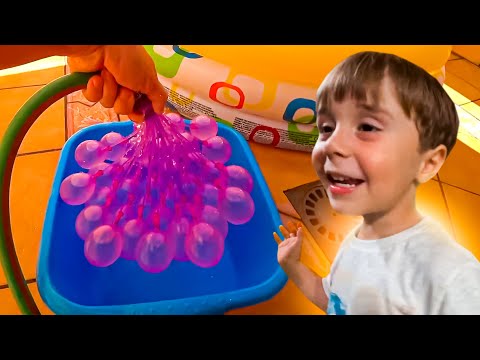 DESAFIO NA PISCINA COM 100 BALÕES E MEGA DINOSSAURO - Brancoala Kids