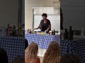Kathy doing cooking demonstrations at the Annunciation Greek Orthodox Church Fedtival.