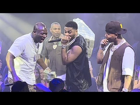 Nelly performs “Hot In Herre” with a Big Bag of Money at Club E11even