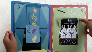 The World-Famous Board Book of Magical NUMBERS with Lift-the-flap, Pop-up, Pull the tab Features!