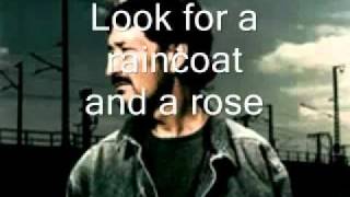 Chris Rea Raincoat and a Rose Lyrics.wmv