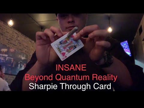 Sharpie through card: Beyond Quantum reality