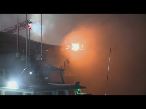 Massive fire on Portland Pier appears to die down, heavy smoke still present