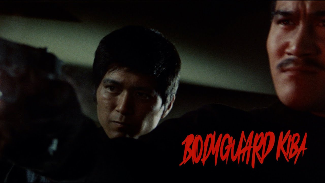 Japanese mafiosi emerge from the hotel furniture