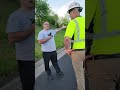 Unhinged off duty officer trys to bully and intimidate road construction crew .