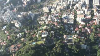 Jeb Corliss flying under the Christ Statue