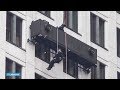 Glazenwassers bungelen twee uur stuurloos op achttiende verdieping - RTL NIEUWS