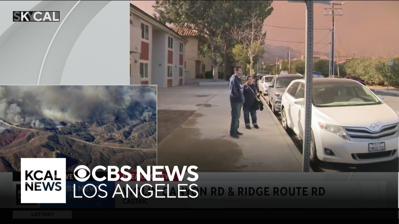 Residents hose down homes as Hughes Fire grows
