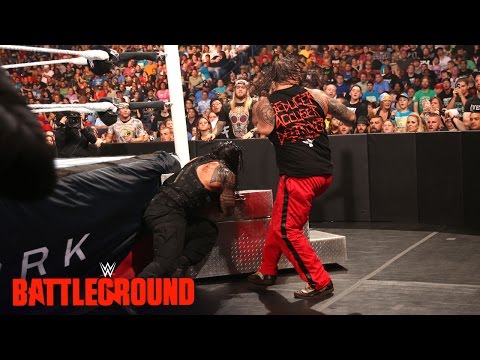 WWE Network: Roman Reigns runs directly into the steel ring steps: WWE Battleground 2015