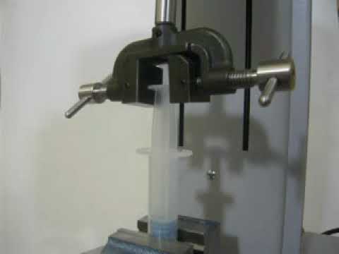 Syringe plunger compression resistance test