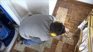 Exemplo de reparação e afagamento de parquet