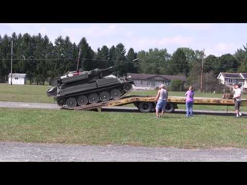 British Alvis CVR(T) Sabre light tank getting loaded up on a flatbed