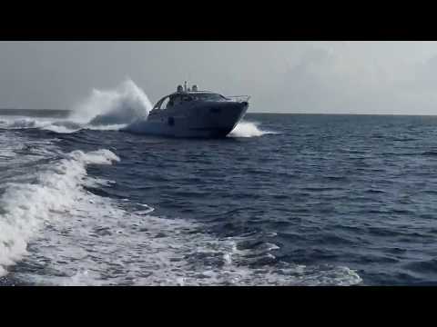 Pershing 5X yacht passing FULL SPEED VERY CLOSE to another yacht - view from inside
