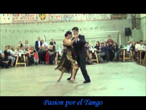  Maria Ines Bogado  and  Sebastian Jimenez  are  dancing  to  the  vals  "  Dichas Que Vivi  "