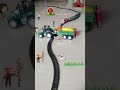 Farm Tractor Carrying Vegetables And The Train Is Approaching Fast