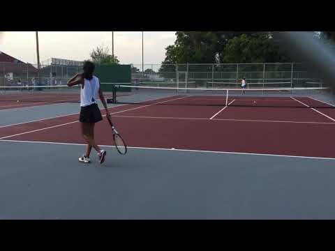 Grace playing singles tennis match - 9 16 2019