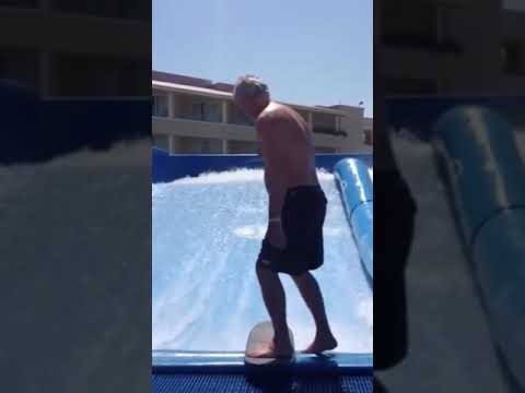 Surf dude shows the kids how to do it
