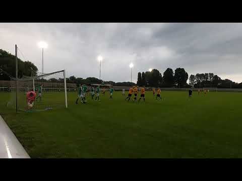 Aaron Berry levels the score for Aylesbury United against MK Irish