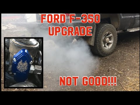 03 Ford F-350 goes down SMOKING!!! Sinister Diesel blue spring kit.