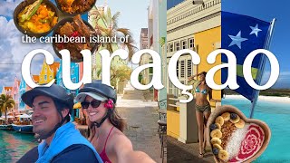 CURAÇAO VLOG🌺: Caribbean food! trying iguana, lion fish and more! 🦎
