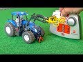RC tractor gets unboxed and tested! Hay bale gripper!