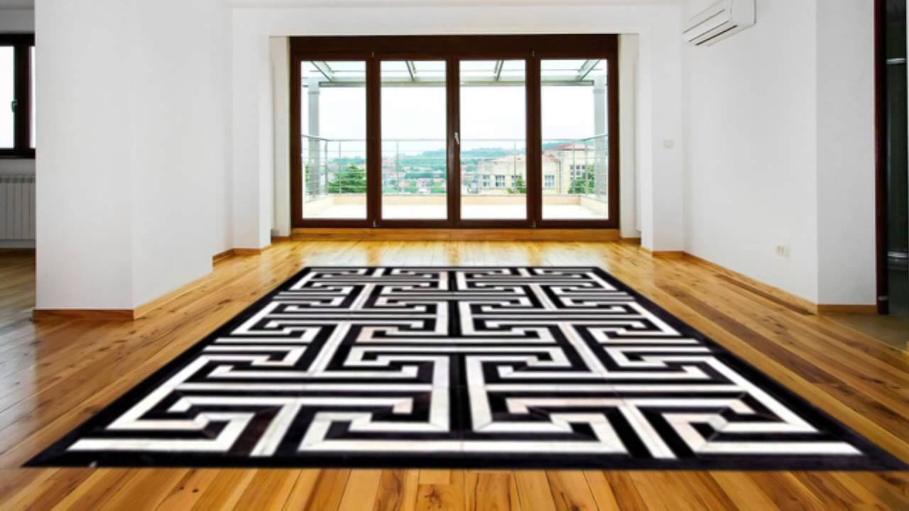 Geometric Pattern Black And White Cowhide Area Rug - POSH RUG