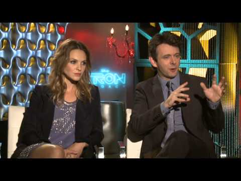 TRON Legacy: Beau Garrett "Gem" & Michael Sheen "Castor/Zuse" Exclusive Interview | ScreenSlam