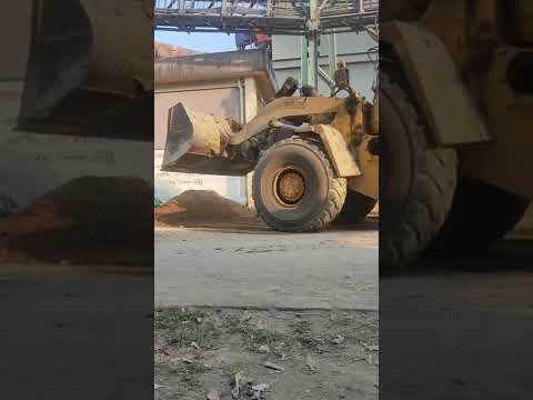 A loader is a heavy equipment machine used in construction to move or load materials