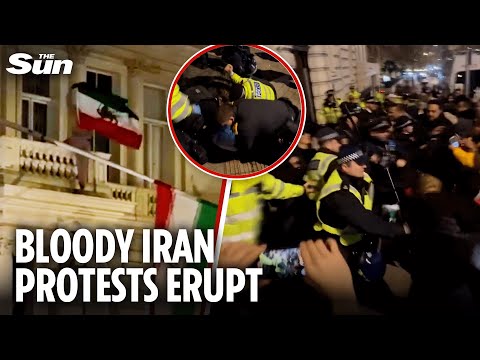 Protesters injured in VIOLENT clashes with cops outside Iranian embassy in London