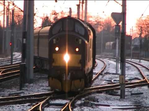 Class 37 No 37706 with horns at Carnforth with 5Z97 WCRC ECS move from Southall 22/12/2010