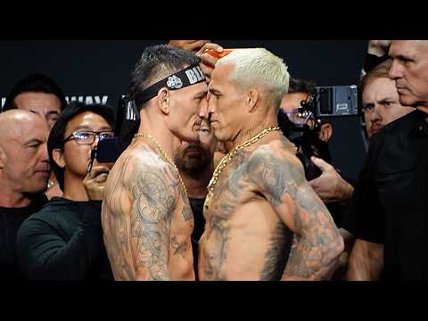 HEATED -Max Holloway RUNS UP on Charles Oliveira during HYPED Weigh In Face Off!