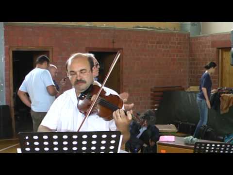 Marin Bunea demonstrating tune in 7 8 written in 2 4