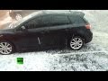 RAW: Powerful thunderstorm creates rivers of hail in.