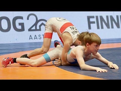 U13 Oskar Olava (FIN) vs Valtteri Parkko (FIN) 38kg. Greco-roman boys youth wrestling. B-cam-man