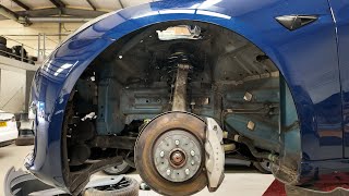 Replacing the upper control arms on a Tesla Model 3!