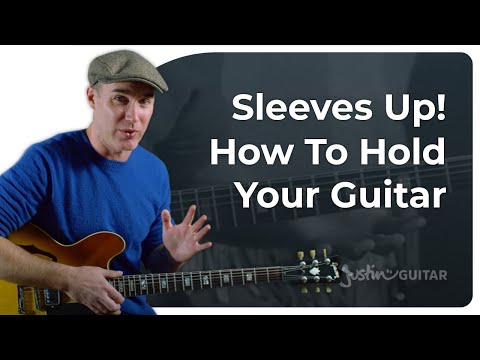 Holding the Guitar with Your Fretting Hand? | Guitar for Beginners