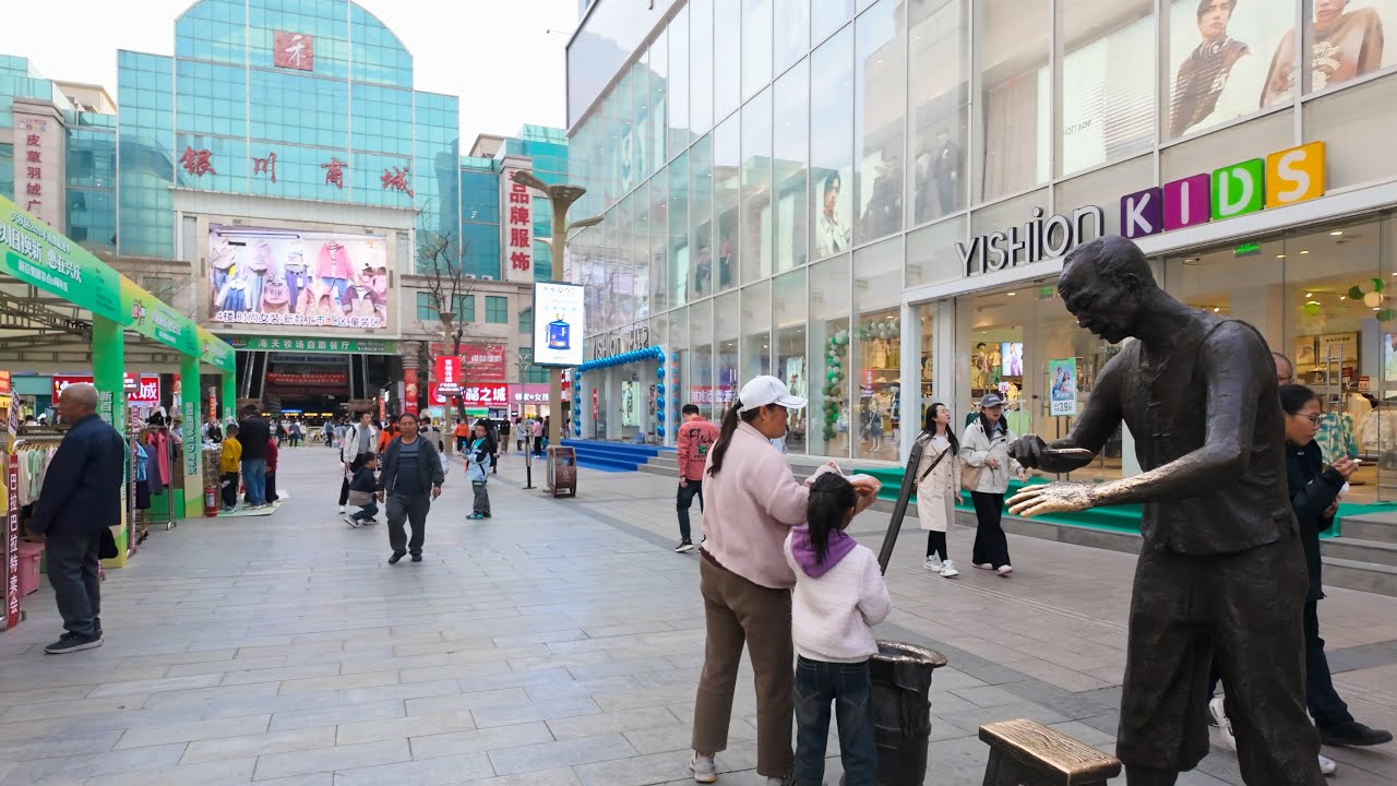 Immersive street-level walking tour through Yinchuan Drum Tower, China, showcasing authentic urban landscapes, local architecture, and the vibrant atmosphere of the city's neighborhoods