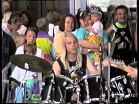 Beherit playing a battle of the bands at a shopping mall in 1990