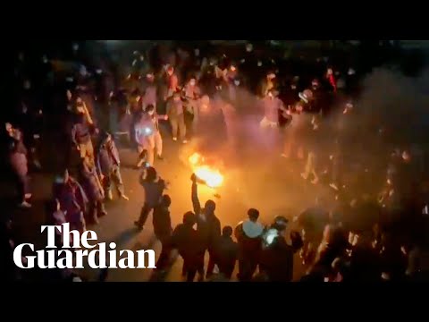 Protesters face police across Iran