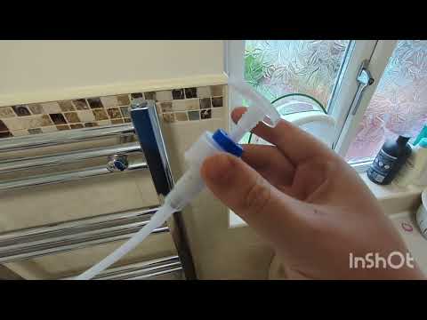 Add inhibitor to central heating system via a Towel Rail - drain using a soap pump!